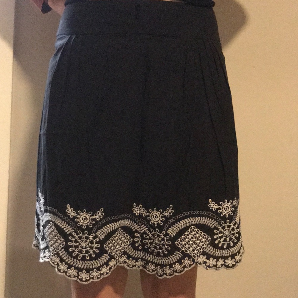 Black skirt with white embroidery